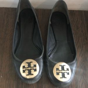 Tory Burch flats with gold emblem